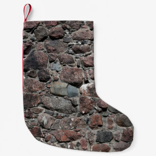 Meia De Natal Pequena A textura medieval da parede de pedra é um resumo,