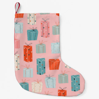 Meia De Natal Pequena Colorful Christmas gifts on a pink background. Sea