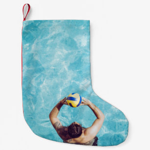 Meia De Natal Pequena Desconhecido jogando voleibol de praia