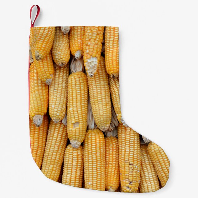 Meia De Natal Pequena Dried corn that was stacked . (Frente)