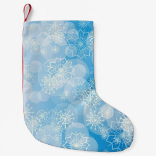 Meia De Natal Pequena Flocos de neve de Natal em um fundo azul
