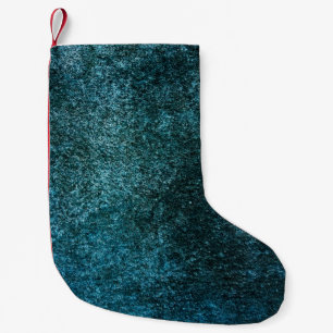 Meia De Natal Pequena Fundo azul escuro que é superfície áspera. resumo