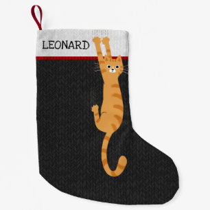 Meia De Natal Pequena  Gato De Tabby Laranja, Prendendo-Se Em Gato De Ba