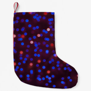 Meia De Natal Pequena Luzes de Natal, turvas, fundo festivo.