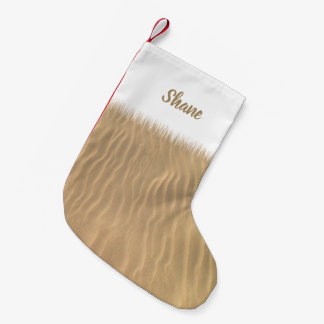 Meia De Natal Pequena Natal nas Práticas de Areia de Praia