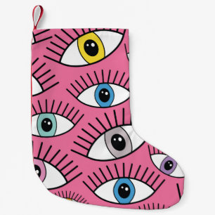 Meia De Natal Pequena Padrão mágico com olhos coloridos. Fundo místic