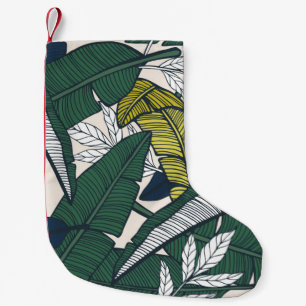 Meia De Natal Pequena Um padrão tropical perfeito com folhas de banana.