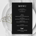 Menu Janto de Casamento Negro Elegante Simples de<br><div class="desc">Uma placa de menu janta preta apresenta o menu em caracteres brancos. Barato 110 lb. papel mede 5, 5" x 8, 5". Perfeito para uma recepção de casamento moderna, janto de ensaio de casamento, festa de aniversário ou qualquer evento especial com um janto sentado. MAIS CORES, tamanhos e preços em...</div>