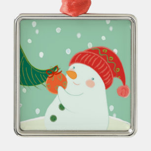 Metal Um boneco de neve que pendura um ornamento em uma