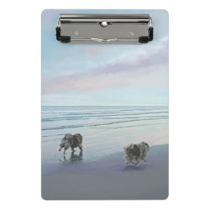 Mini Prancheta Keeshonds na Arte de Cão de Pintura em Seashore