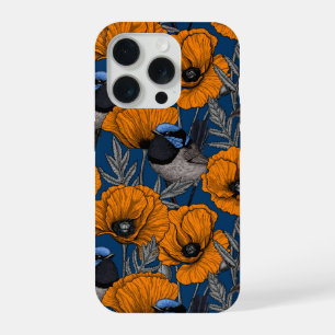 Moinhos de fada e flores de papoila laranja