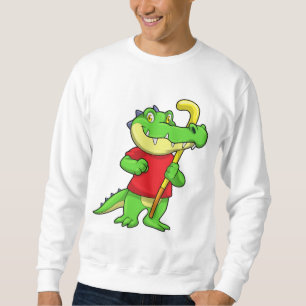 Moletom Crocodilo no hóquei de campo com taco