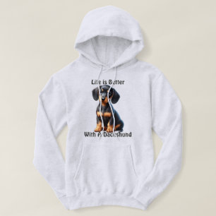 Moletom Dachshund Puppy Sentado e Olhando com Inocente