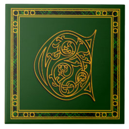 Monograma "ouro irlandês de C" em azulejos verdes