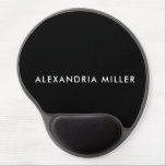 Mouse Pad De Gel Preto e Branco minimalista moderno personalizado<br><div class="desc">Aumente a configuração da sua mesa com este moderno mouse personalizado preto e branco minimalista. O design elegante e simples apresenta o seu nome em uma fonte de sans serif branca e limpa em um plano de fundo preto. É perfeito para adicionar um toque de sofisticação ao seu espaço de...</div>
