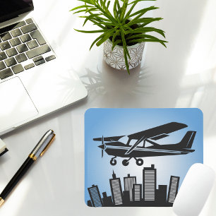 Mousepad Cessna legal voando a céu azul sobre a cidade, Avi