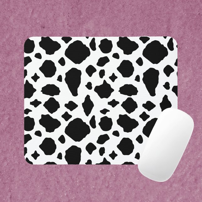 Mousepad Cow Print Black and White (A mouse pad with a black and white cow print pattern.)