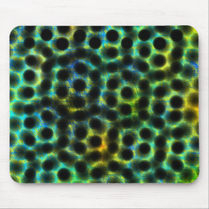 Mousepad esverdeado, bolinhas pretas gerando formas, sombra
