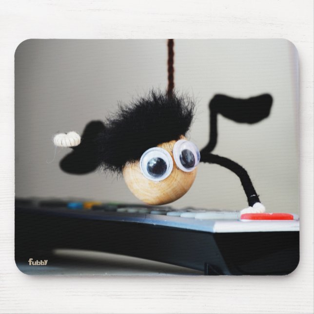 Mousepad Fubby hangend als de scene van Tom Cruise. (Frente)