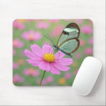 Mousepad Glasswing Butterfly On a Cosmos Flower<br><div class="desc">A delicate glasswing butterfly with transparent wings gently settles on a vibrant pink cosmos flower,  creating a dreamlike scene enhanced by a soft focus background</div>