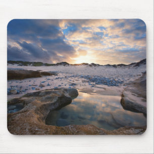 Mousepad No por do sol em uma poça