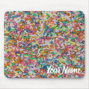 Mousepad O açúcar borrifa um prato de fundo colorido