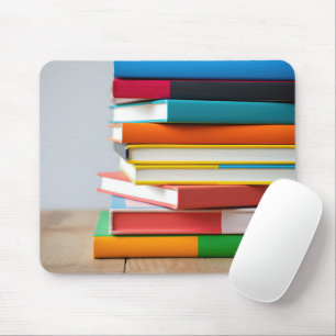 Mousepad Pilha de manuais coloridos