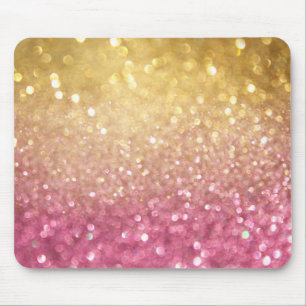 Mousepad rosa e olhar do brilho do ouro