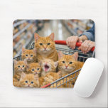 Mousepad Shopping Cart Filled with Orange Tabby Cats<br><div class="desc">A group of ginger cats huddles together in a shopping cart in a store aisle with curious expressions</div>
