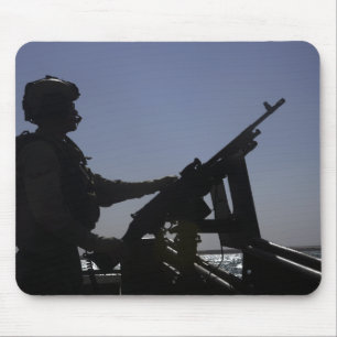 Mousepad Técnico que equipa uma metralhadora M240 em Iraqu