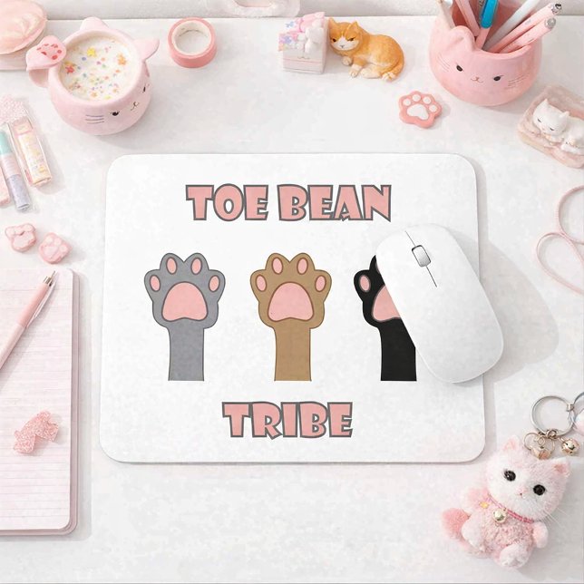Mousepad Toe Bean Tribe Cute Kitty Cat Paws Pink (A mouse pad with three cat paws and the words toe bean tribe in pink and gray letters.)