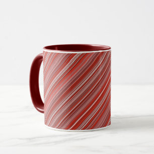 Muitas tiras coloridas na caneca de café vermelha