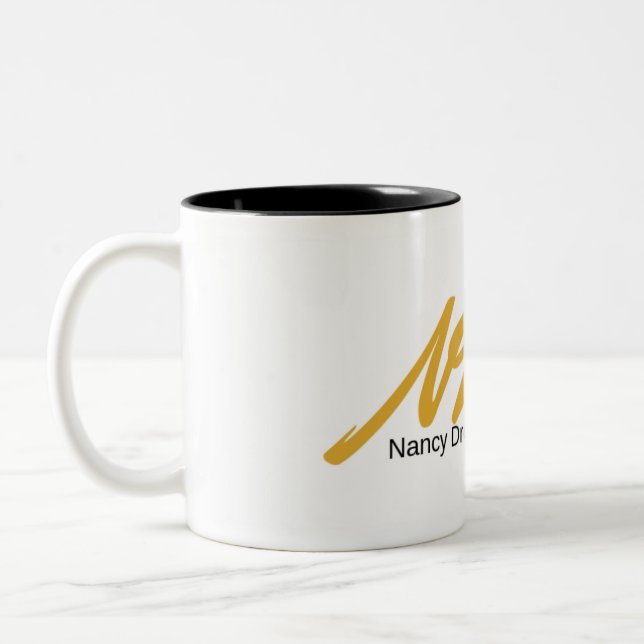 Nancy tirou - a caneca do autor (Esquerda)