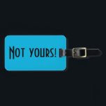 Não Sua Etiqueta De Bagagem<br><div class="desc">Esta etiqueta de bagagem não é sua é uma maneira inteligente de dizer às pessoas do carrossel de bagagem para continuar procurando. Ele apresenta um fundo azul vibrante e uma letra preta e ousada que diz,  "Não é seu!" O lado oposto está pronto para a personalização.</div>