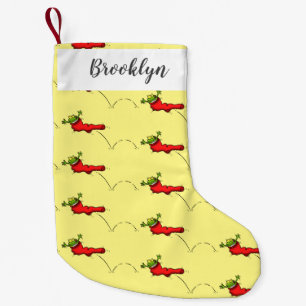 Natal Pequena Sapo bonito em um desenho de salto em meia vermelh