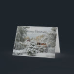 Neve do inverno no cartão de Natal de Utá<br><div class="desc">Uma cena impressionante da neve em pouca fazenda de Utá. Pinho e coelho Bush,  cerca reunida do registro,  celeiro vermelho e um lama que espreita fora de seu abrigo. O cartão tem o ` do Feliz Natal do ` na parte dianteira. personalize as características disponíveis.</div>