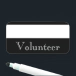 Nome de etiqueta "Voluntário" de Vintage<br><div class="desc">Este nome de etiqueta de crachá do estilo velintage e do estilo tradicional voluntário de apagamento seco reutilizável apresenta a mensagem "Voluntário". Inclui também uma área em que o nome de um voluntário poderia ser escrito utilizando um marcador de apagamento a seco. Um crachá do estilo nametag como este pode...</div>