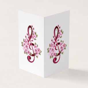 Notas de clave de trecho musical com flores de Sak