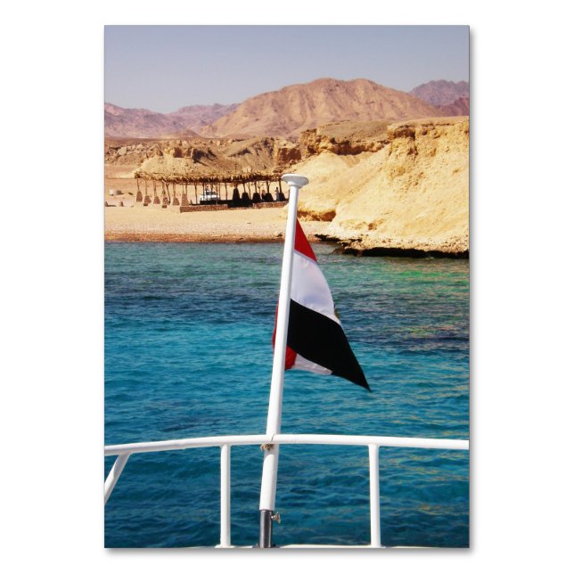 Numeração De Mesa Bandeira egípcia no fundo da água do azure (Frente)