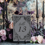 Numeração De Mesa Bat Vitoriano Até Casamento de Cinzas e Negra Mort<br><div class="desc">Elevem seu casamento gótico com um número de mesa de casamento inspirado na Vitoriana que exude elegância e mistério do eterno. Projetado para se assemelhar a uma antiga ligação a livros, este design impressionante apresenta um arquivo preto e cinza lacey, evocando o charme de uma era passada. Deixe sua história...</div>