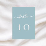 Numeração De Mesa Casamento de guião branco azul-Dusty<br><div class="desc">Um fundo azul empoeirado decorado. Texto branco. Personalize e adicione seus números de tabela. Adicione seus números um a um.</div>