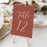 Numeração De Mesa Casamento Simples de Arroz<br><div class="desc">Números da tabela de casamento elegantes que apresentam o número da tabela exibido em um simples roteiro branco com fundo de ferrugem. As cores do texto e do plano de fundo podem ser alteradas para as cores do casamento usando as ferramentas de edição. Para solicitar essas placas de mesa, edite...</div>