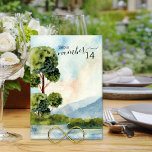 Numeração De Mesa Lago Evergreen Watercolor, Editável<br><div class="desc">Carta de número da mesa de casamento do lago Evergreen com cor d'água com paisagem cênica idílica. Paisagem com árvores verdes e verdes, montanhas azuis e um lago ainda sob um céu azul claro. A design está em tons de azul empoeirado, marrom-reluzente e verde e é escrita com elegância e...</div>