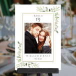 Numeração De Mesa Nome da Foto Greenery Data Casamento<br><div class="desc">Este elegante eucalipto verde deixa o número da mesa com folhas delicadas de aquarela com sua foto especial,  nome e data moldados por uma borda dourada. Projetado por Thisnotme©</div>