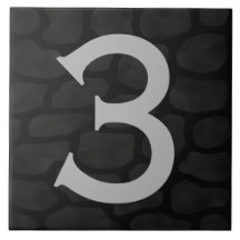 Número da casa em azulejos de pedra pretos celtas