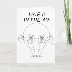 **O AMOR** ESTÁ NO AR **NO NOSSO CARTÃO ANIVERS