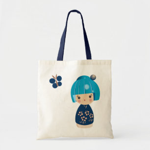 O bolsa azul da objectiva tripla de Kokeshi