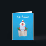 O cartão espanhol do papai noel do Natal "cupcake<br><div class="desc">Um cartão de Natal espanhol feito sob medida menor com papai noel sobre um cupcake, de uma colagem de papel pintado à mão por Judy Adamson. Contacte-me por favor através de minha loja se você gostaria do texto da capa mudado e o interior é deixado vazio para sua própria mensagem....</div>