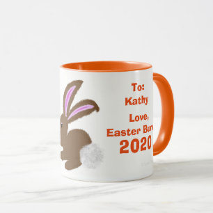 O coelhinho da Páscoa Eggs a caneca da lembrança