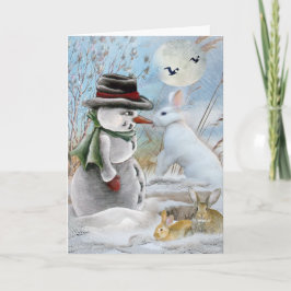 O coelho come cartões do nariz do boneco de neve